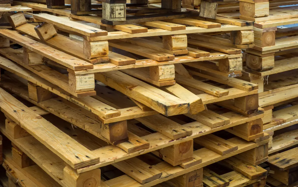 Stacks of wooden pallets ready for storage and transport